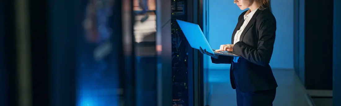 An engineer checking infrastructure in a secure data centre